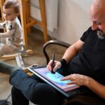 My Story: How to turn passion into income - Leo Grzyb working on a project with HH the 17th Karmapa, accompanied by his daughter Léda.